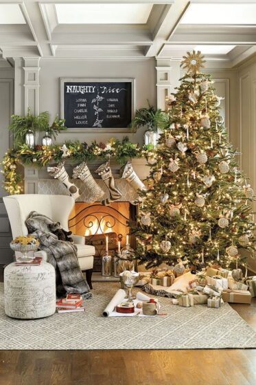 Christmas tree next to the fireplace 736x1104