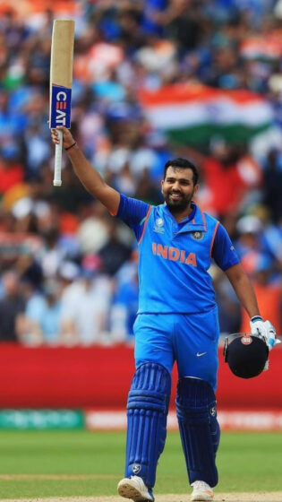rohit sharma wallpaper in stick raising pose for phone 1080x1920