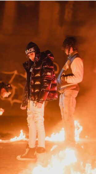 dd osama wallpaper in the middle of the fire circle 748x1348