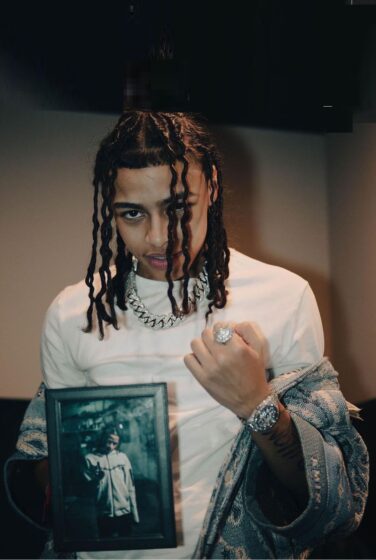 dd osama wallpaper with photo in hand 100x1608