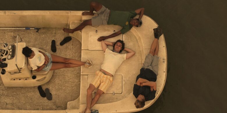 outer banks wallpaper with members lying on the train 3200x1600