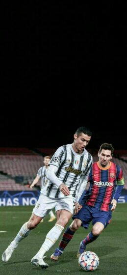Messi and Ronaldo wallpaper are fighting for the ball 736x1593